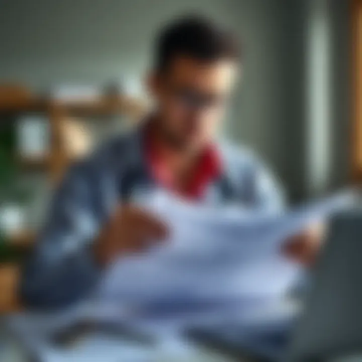 Rebuilding Credit After Bankruptcy Individual analyzing financial documents for credit rebuilding