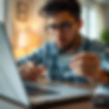 Analyzing Credit Card Features A person analyzing credit card features on a laptop.