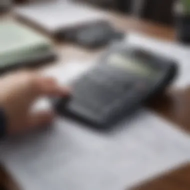 Close-up of a calculator and tax documents on a desk